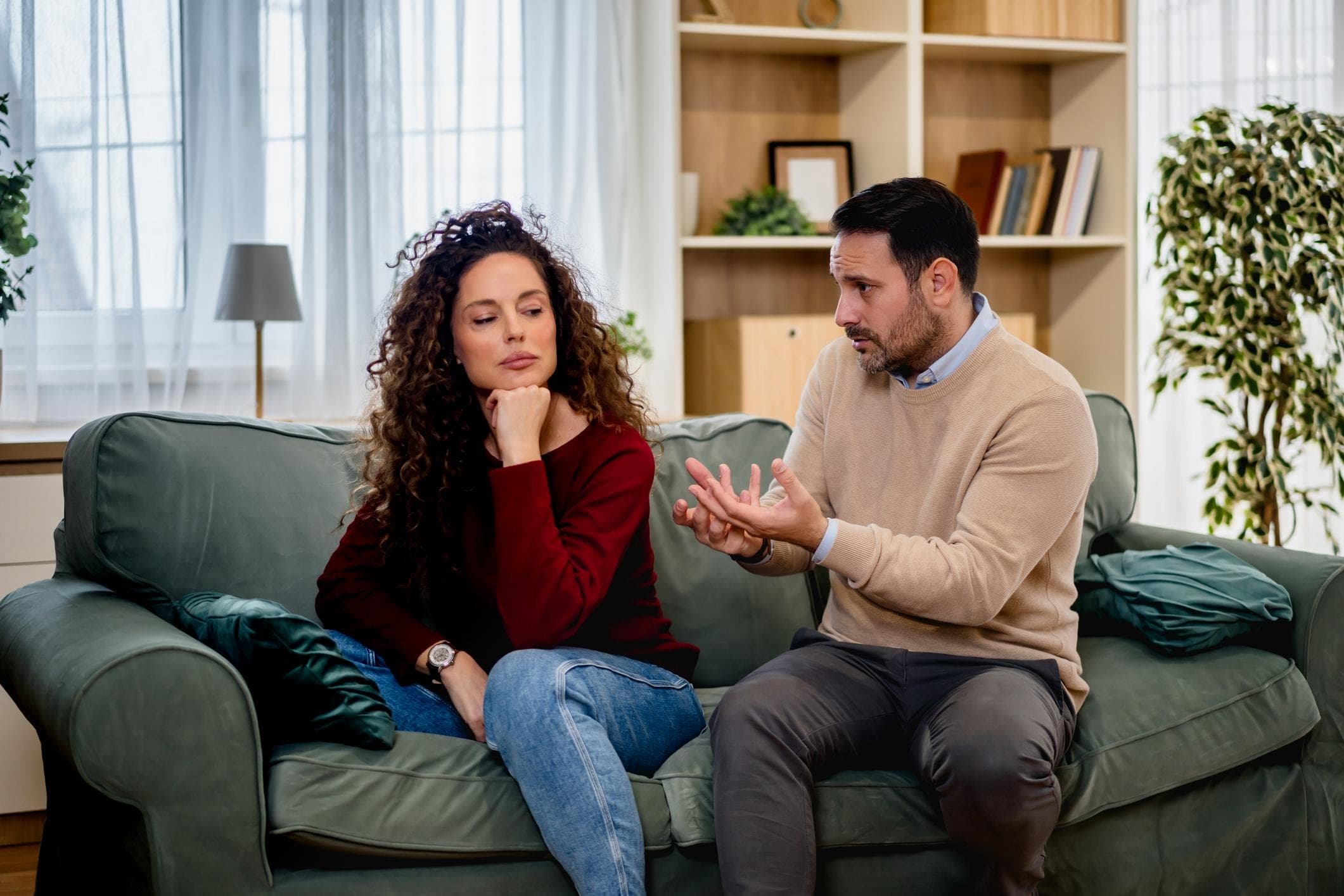 Marriage Counseling Husband and wife having a serious disagreement while maintaining personal space.