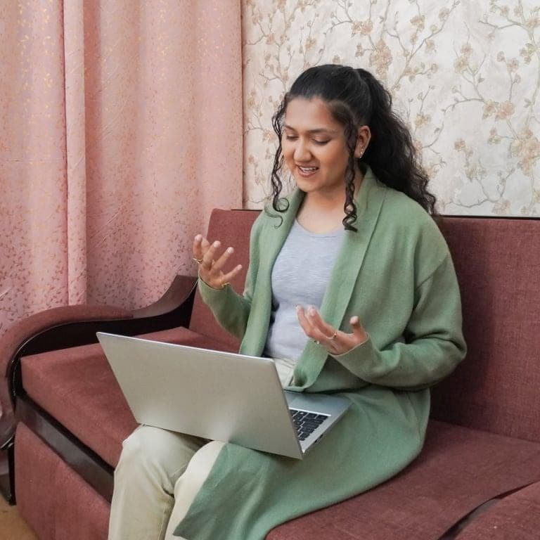 Online CBT Consultancy for Flexible Support Person attending a CBT counseling session through a laptop from a comfortable home environment.  Use for: