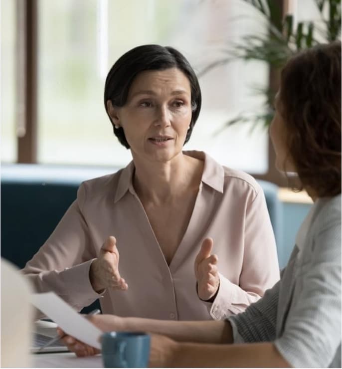 A counsellor and client talking during a one-to-one session with Management of Phobia and Personal Growth